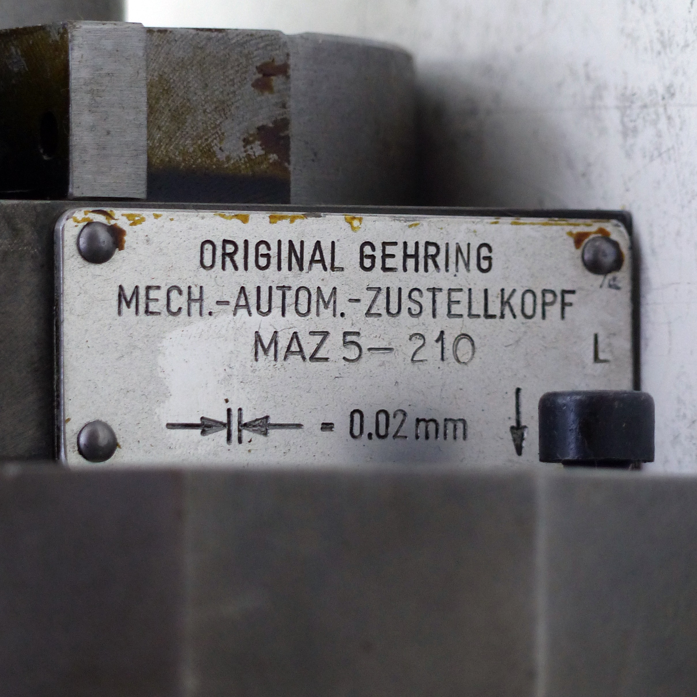 Mech.-Autom.-Zustellkopf