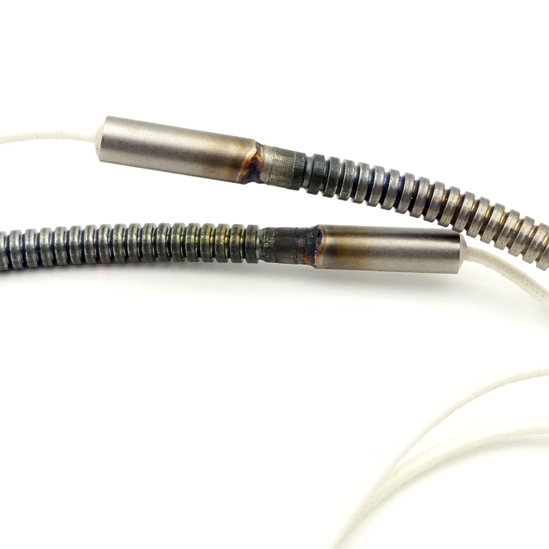 Flexible tubular heating element
